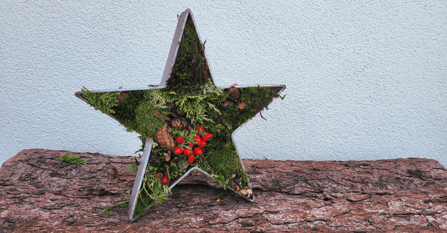 Metallstern für Weihnachten dekorieren